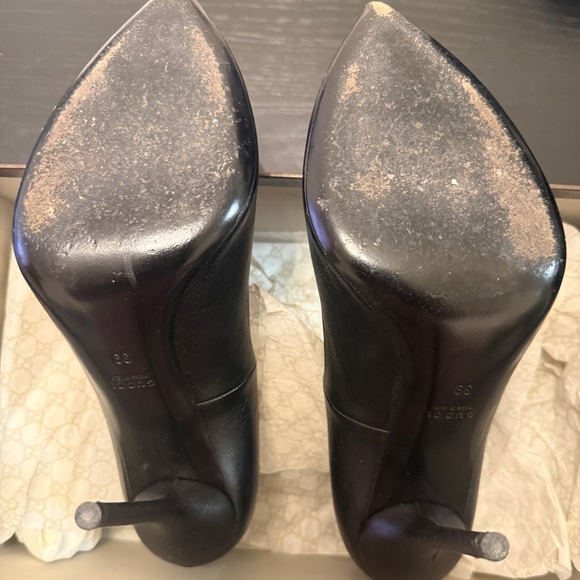 gucci heels 37 black with gold logo worn 3 times no damage  Gucci Black Leather Women\'s Heels